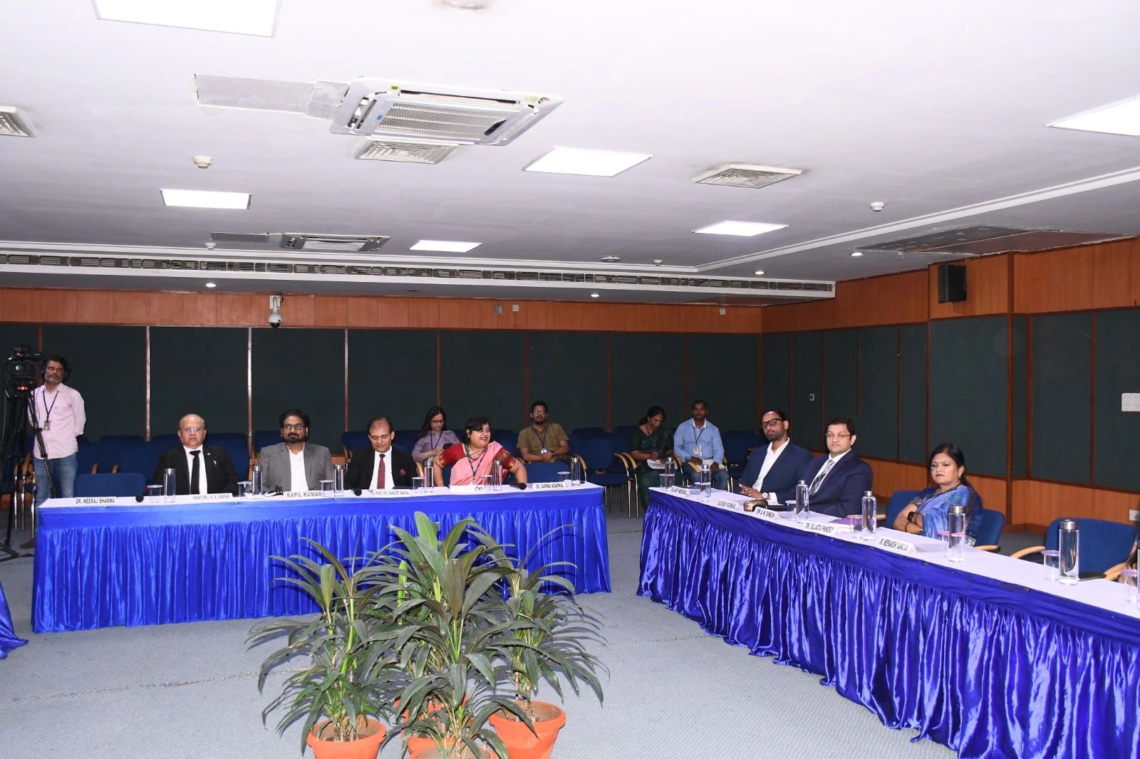 Amity University — Wide dais view: Dr. Neeraj Sharma, Prof. (Dr.) R. K. Kapur, Mr. Kapil Kumar, Prof. (Dr.) Sanjeev Bansal, Dr. Garima Agarwal, Dr. B. K. Murthy, Dr. Sujata Pandey and Dr. Hemashri Vahia on the panel.